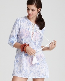 This elegant tunic from Odademar features a whimsical sea creature print. This elegant tunic from Odademar features a whimsical sea creature print.