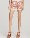 Spring's floral trend arrives in fruitful style with these printed shorts from DIANE von FURSTENBERG and Current/Elliott. Featuring a rolled cuff for polish, the silhouette travels from cabana to clubhouse in seamless fashion.