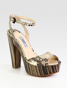 Python adjustable ankle strap style with a wood platform and heel. Wooden heel, 5 (125mm)Wooden platform, 1 (25mm)Compares to a 4 heel (100mm)Python upperLeather lining and solePadded insoleMade in ItalyOUR FIT MODEL RECOMMENDS ordering one half size up as this style runs small. Python adjustable ankle strap style with a wood platform and heel. Wooden heel, 5 (125mm)Wooden platform, 1 (25mm)Compares to a 4 heel (100mm)Python upperLeather lining and solePadded insoleMade in ItalyOUR FIT MODEL RECOMMENDS ordering one half size up as this style runs small.