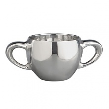 Nambé two handles design has a soft flowing design. Easy to hold, functionaland beautiful. Has a modern look for a traditional gift. Perfect gift for the new addition to yourfamily. This gift will be passed down as a family heirloom. Part of the Nambé Baby Collection, pairwith any part of this collection. Can be engraved for a personal touch in gift giving. Designed by Sean O'Hara. Nambé two handles design has a soft flowing design. Easy to hold, functionaland beautiful. Has a modern look for a traditional gift. Perfect gift for the new addition to yourfamily. This gift will be passed down as a family heirloom. Part of the Nambé Baby Collection, pairwith any part of this collection. Can be engraved for a personal touch in gift giving. Designed by Sean O'Hara.