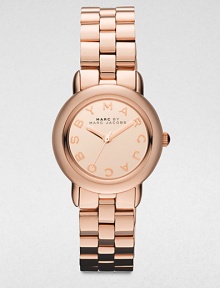 A warm rose goldtone ion-plated stainless steel timepiece with logo markers. Quartz movementWater resistant to 5 ATMRound rose goldtone ion-plated stainless steel case, 27.5mm (1)Smooth bezelRose goldtone mirror dialLogo hour markersSecond hand Rose goldtone stainless steel link braceletImported A warm rose goldtone ion-plated stainless steel timepiece with logo markers. Quartz movementWater resistant to 5 ATMRound rose goldtone ion-plated stainless steel case, 27.5mm (1)Smooth bezelRose goldtone mirror dialLogo hour markersSecond hand Rose goldtone stainless steel link braceletImported