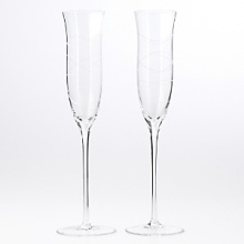 Whether you sip champagne every day or only on special days and nights, it's always better sipped from a flute. The Morph crystal flutes are festively engraved with dancing lines. Perfect for celebrating the special occasions of your life. Whether you sip champagne every day or only on special days and nights, it's always better sipped from a flute. The Morph crystal flutes are festively engraved with dancing lines. Perfect for celebrating the special occasions of your life.