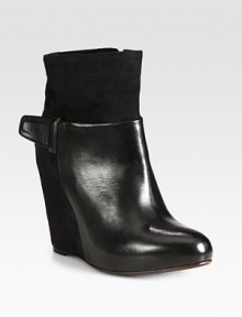 This fashion-forward staple combines polished leather and smooth suede for a layered finish.Suede-covered wedge, 4¼ (110mm)Leather-covered platform, 1 (25mm)Compares to a 3¼ heel (80mm)Leather and suede upperSide zipTab detailLeather lining and solePadded insoleMade in Italy This fashion-forward staple combines polished leather and smooth suede for a layered finish.Suede-covered wedge, 4¼ (110mm)Leather-covered platform, 1 (25mm)Compares to a 3¼ heel (80mm)Leather and suede upperSide zipTab detailLeather lining and solePadded insoleMade in Italy