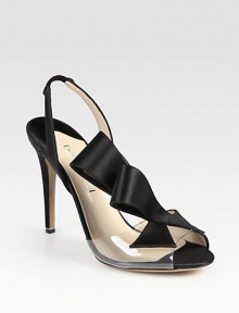 Secured by a stretchy slingback, an oversized, abstract bow rests upon a clear strap while smooth satin adds of touch of shine. Self-covered heel, 4 (100mm)Satin, suede and pvc upperLeather lining and solePadded insoleMade in ItalyOUR FIT MODEL RECOMMENDS ordering one half size up as this style runs small. Secured by a stretchy slingback, an oversized, abstract bow rests upon a clear strap while smooth satin adds of touch of shine. Self-covered heel, 4 (100mm)Satin, suede and pvc upperLeather lining and solePadded insoleMade in ItalyOUR FIT MODEL RECOMMENDS ordering one half size up as this style runs small.