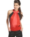 The party top gets a cool dose of colorblocking in this bold halter style from XOXO!