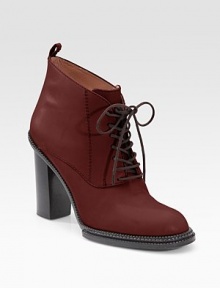 Exquisite leather style with a lace-up front and chunky stacked heel. Stacked heel, 4 (100mm) Covered platform, ¼ (5mm) Compares to a 3¾ heel (95mm) Leather upper Leather lining and sole Padded insole Made in Italy Exquisite leather style with a lace-up front and chunky stacked heel. Stacked heel, 4 (100mm) Covered platform, ¼ (5mm) Compares to a 3¾ heel (95mm) Leather upper Leather lining and sole Padded insole Made in Italy