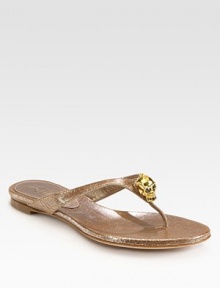 Signature goldtone skull adornment adds edge to this metallic leather thong design. Metallic leather upperLeather lining and solePadded insoleMade in ItalyOUR FIT MODEL RECOMMENDS ordering true size. Signature goldtone skull adornment adds edge to this metallic leather thong design. Metallic leather upperLeather lining and solePadded insoleMade in ItalyOUR FIT MODEL RECOMMENDS ordering true size.
