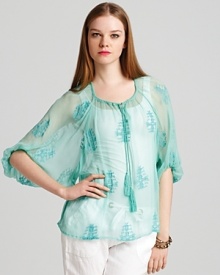 Ethereal and elegant, this Sanctuary tunic embodies the lightness of spring. Pair it with white and layer on the accessories for a casual-cool finish. Ethereal and elegant, this Sanctuary tunic embodies the lightness of spring. Pair it with white and layer on the accessories for a casual-cool finish.