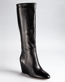 A must-have from Loeffler Randall--these go-everywhere boots, crafted in luxe leather, boast a sleek and streamlined almond-toe silhouette. A must-have from Loeffler Randall--these go-everywhere boots, crafted in luxe leather, boast a sleek and streamlined almond-toe silhouette.