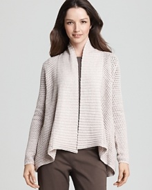 The essential cardigan gets a makeover with this Eileen Fisher sweater, styled with a shapely silhouette, an open front and pointed hem. The essential cardigan gets a makeover with this Eileen Fisher sweater, styled with a shapely silhouette, an open front and pointed hem.