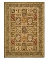 For decor that demands attention. This Safavieh area rug features an intricate patchwork pattern that encapsulates the beauty and detail of time-honored Persian designs. Highlighted in welcoming green tones and crafted from soft polypropylene, this rug radiates timeless allure with the added convenience of easy-care construction.