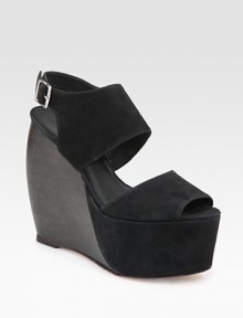 Wondrous wedge design with soft suede straps, an ankle buckle, and an uplifting platform. Wooden wedge, 5½ (140mm) Covered platform, 2¼ (60mm) Compares to a 3¼ heel (80mm) Suede upper Leather lining and sole Padded insole Made in ItalyOUR FIT MODEL RECOMMENDS ordering one size up as this style runs small. Wondrous wedge design with soft suede straps, an ankle buckle, and an uplifting platform. Wooden wedge, 5½ (140mm) Covered platform, 2¼ (60mm) Compares to a 3¼ heel (80mm) Suede upper Leather lining and sole Padded insole Made in ItalyOUR FIT MODEL RECOMMENDS ordering one size up as this style runs small.