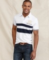 Classic preppy style to complete your casual look. This polo from Tommy Hilfiger is perfect for your laid-back style.