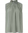 Conjure Parisian cool with this elegant and ultra-feminine, chalk-hued Vanessa Bruno blouse - Crafted from a sumptuously soft, pure silk - Slim-cut sleeveless style with gently pleated front and gathered stand-up collar - Polished and chic, seamlessly transitions from work to weekend - Pair with a pencil skirt or suit trousers by day, and with skinny denim or leather pants by night