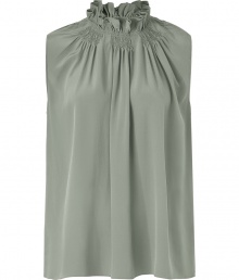 Conjure Parisian cool with this elegant and ultra-feminine, chalk-hued Vanessa Bruno blouse - Crafted from a sumptuously soft, pure silk - Slim-cut sleeveless style with gently pleated front and gathered stand-up collar - Polished and chic, seamlessly transitions from work to weekend - Pair with a pencil skirt or suit trousers by day, and with skinny denim or leather pants by night Conjure Parisian cool with this elegant and ultra-feminine, chalk-hued Vanessa Bruno blouse - Crafted from a sumptuously soft, pure silk - Slim-cut sleeveless style with gently pleated front and gathered stand-up collar - Polished and chic, seamlessly transitions from work to weekend - Pair with a pencil skirt or suit trousers by day, and with skinny denim or leather pants by night