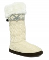 A winter wonderland is calling! Dress the part with these cozy, cable knit boot slippers by Muk Luks® featuring a snowflake pattern at top and foldover faux fur cuff.