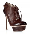 Luxe ankle boots in supple chocolate leather - Part Oxford lace up, part platform pump, all glam! - Rounded cap toe and side zip - Elegant leather banding beneath sole and at backstay - 5.5 pencil heel and 1.2 stacked platform - A sexy, on-trend shoe guaranteed to turn heads - Pair with skinny pants, pencil skirts and mini dresses