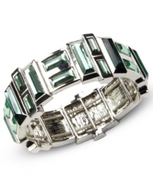 Green with envy. This Nine West bracelet showcases captivating plastic erinite stones set in a sleek setting. Stretches to fit wrist. Crafted in imitation rhodium tone mixed metal. Approximate diameter: 2 inches. Green with envy. This Nine West bracelet showcases captivating plastic erinite stones set in a sleek setting. Stretches to fit wrist. Crafted in imitation rhodium tone mixed metal. Approximate diameter: 2 inches.
