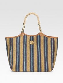 Classic striped burlap crafted with a roomy interior, leather trim and signature woven handles.Double top handles, 8¼ dropMagnetic top closureOne inside zip pocketTwo inside open pocketsCanvas lining15W X 13½H X 5¾DImported