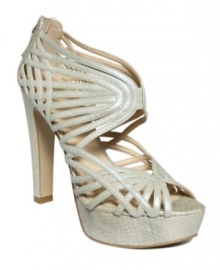 Glamour takes a turn for the exotic. Metallic snake-print leather and intricately woven straps make their mark on the Cannonball platform sandals by Nine West. Glamour takes a turn for the exotic. Metallic snake-print leather and intricately woven straps make their mark on the Cannonball platform sandals by Nine West.