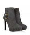 This Diane von Furstenberg ankel bootie is a year-round favorite - Sleek in charcoal-grey suede with a gold-color buckle and zip - Features a dared crescent toe, hidden platform and thin, sexy heel - Pair with leather leggings or skinny jeans, and a silk blouse and blazer, or a cocktail dress