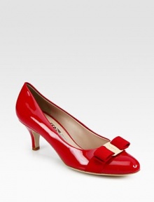 Superior craftsmanship in sleek patent leather with signature, grosgrain bow and logo hardware.Self-covered heel, 2¼ (60mm) Pointed toe Leather lining and sole Made in ItalyOUR FIT MODEL RECOMMENDS ordering true size.. 
