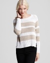 An versatile layer for your getaway wardrobe, this lightweight striped 525 America sweater is designed with a high/low hem and classic side vents. Team it with slim black pants or wear it over a maxi dress when the breeze sets in.