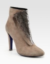 For an exotic edge try this lifted suede ankle boot with snake-print leather paneling and an easy side zip. Self-covered heel, 4¼ (110mm)Suede and snake-print leather upperSide zipLeather lining and solePadded insoleImported