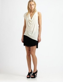 Jersey cowlneck with a single short sleeve and asymmetrical hem captures the season's commitment to cool. CowlneckSingle short sleeveAsymmetrical hemModalDry cleanMade in USAModel shown is 5'11 (180cm) wearing US size Small. Jersey cowlneck with a single short sleeve and asymmetrical hem captures the season's commitment to cool. CowlneckSingle short sleeveAsymmetrical hemModalDry cleanMade in USAModel shown is 5'11 (180cm) wearing US size Small.
