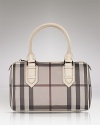 Burberry's signature check lends luxe style to the classic bowling bag silhouette.