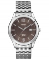 A subtle hint of charcoal tones bring understated style to this classic men's watch from Timex.