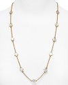 Add a just-right dash of classic cool with this Mother-of-Pearl bib necklace from kate spade new york. It's single strand design perfects understated accessorizing.