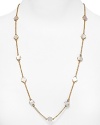 Add a just-right dash of classic cool with this Mother-of-Pearl bib necklace from kate spade new york. It's single strand design perfects understated accessorizing.