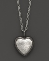 A hammered sterling silver heart makes a romantic, modern statement.