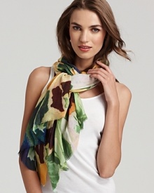 Soft abstract flowers decorate this luxurious cashmere and silk scarf from Bindya. Soft abstract flowers decorate this luxurious cashmere and silk scarf from Bindya.