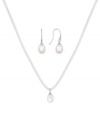 Casual chic. This pendant and earrings set from Majorica pops with organic man-made pearls (9 mm). The ivory-colored cord necklace adds a touch of whimsy. Crafted in silver tone mixed metal. Approximate length: 16 to 18 inches. Approximate drop: 1/2 inch.