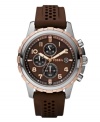 Sport style never looked so handsome. Watch by Fossil crafted of brown perforated silicone strap and round stainless steel case with rose-gold plating at bezel. Brown chronograph dial features applied rose-gold numerals, white minute track, date window at three o'clock, three subdials, three hands and logo. Quartz movement. Water resistant to 50 meters. Eleven-year limited warranty.