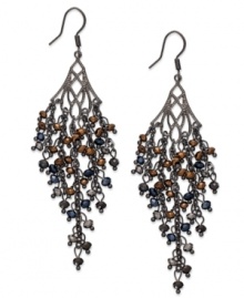 Shower your look in elegance with these chandelier earrings from c.A.K.e. by Ali Khan. Faceted glass rondelles in colorful hues are strung on metal chains for a showering effect. Crafted in hematite tone mixed metal. Approximate drop: 3 inches. Shower your look in elegance with these chandelier earrings from c.A.K.e. by Ali Khan. Faceted glass rondelles in colorful hues are strung on metal chains for a showering effect. Crafted in hematite tone mixed metal. Approximate drop: 3 inches.