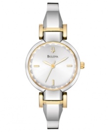 Streamlined and modern, this ultra femme watch from Bulova shines. Silvertone stainless steel bangle bracelet with goldtone accents. Stainless steel round case and dial with logo and stick indices. Quartz movement. Water resistant to 30 meters. 3-year limited warranty. Streamlined and modern, this ultra femme watch from Bulova shines. Silvertone stainless steel bangle bracelet with goldtone accents. Stainless steel round case and dial with logo and stick indices. Quartz movement. Water resistant to 30 meters. 3-year limited warranty.