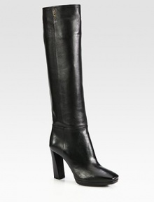 Tall leather silhouette with a square toe, stacked platform heel and side zip. Self-covered heel, 4 (100mm)Self-covered platform, ½ (15mm)Compares to a 3½ heel, (90mm)Shaft, 17Leg circumference, 14½Leather upperSide zipLeather liningRubber solePadded insoleMade in Italy Tall leather silhouette with a square toe, stacked platform heel and side zip. Self-covered heel, 4 (100mm)Self-covered platform, ½ (15mm)Compares to a 3½ heel, (90mm)Shaft, 17Leg circumference, 14½Leather upperSide zipLeather liningRubber solePadded insoleMade in Italy