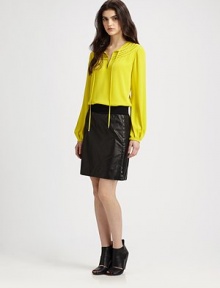 Textured trim, self ties and long bishop sleeves define this easy silk blouse. Split roundneck with self tiesLong bishop sleevesLonger length hits below the hipsSilkDry cleanImportedModel shown is 5'10 (177cm) wearing US size 2. Textured trim, self ties and long bishop sleeves define this easy silk blouse. Split roundneck with self tiesLong bishop sleevesLonger length hits below the hipsSilkDry cleanImportedModel shown is 5'10 (177cm) wearing US size 2.