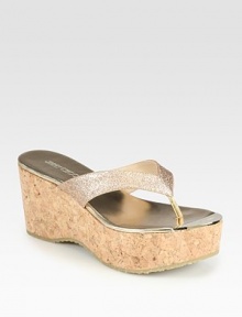 A textured cork wedge heightens this glittery staple with reflective metallic leather accents. Cork wedge, 2¾ (70mm)Cork platform, 1½ (40mm)Compares to a 1¼ heel (30mm)Glitter-coated leather upper with metallic leather trimLeather liningRubber solePadded insoleMade in Spain A textured cork wedge heightens this glittery staple with reflective metallic leather accents. Cork wedge, 2¾ (70mm)Cork platform, 1½ (40mm)Compares to a 1¼ heel (30mm)Glitter-coated leather upper with metallic leather trimLeather liningRubber solePadded insoleMade in Spain