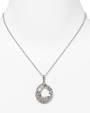 Add a shapely dose of elegance to a sweater or favorite dress with this simple pendant from Carolee, accented with delicate crystals.