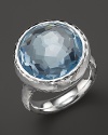 Crystal clear, watery blue topaz is framed in a hammered sterling silver bezel on this must-have Ippolita ring.
