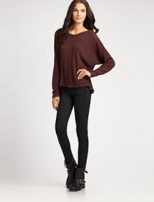 Pure cotton boatneck with allover ribbing and dramatic dolman sleeves. BoatneckLong dolman sleevesCurved hemCottonMachine washMade in USA Pure cotton boatneck with allover ribbing and dramatic dolman sleeves. BoatneckLong dolman sleevesCurved hemCottonMachine washMade in USA