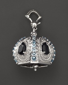 Inspired by Zen philosophy, this polished sterling silver Raja meditation bell from Paul Morelli is set with blue topaz and black spinel. Inspired by Zen philosophy, this polished sterling silver Raja meditation bell from Paul Morelli is set with blue topaz and black spinel.
