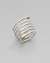 From the Spring Collection. A spiral of hammered sterling silver is richly capped with 24k yellow gold spheres.Sterling silver 24k yellow gold Imported