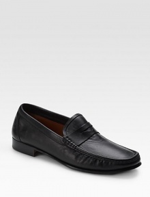 Soft nappa leather shaped with pre-eminent comfort and style in a classic penny loafer design. Leather lining Leather sole Made in Italy 