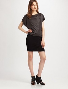 With the look of suede and a velvety texture, this understated dolman top pairs effortlessly with skirts, pants and jeans. BoatneckShort dolman sleevesTubular piping at hemPolyesterDry cleanMade in USA of imported fabricModel shown is 5'10 (177cm) wearing US size Small. With the look of suede and a velvety texture, this understated dolman top pairs effortlessly with skirts, pants and jeans. BoatneckShort dolman sleevesTubular piping at hemPolyesterDry cleanMade in USA of imported fabricModel shown is 5'10 (177cm) wearing US size Small.