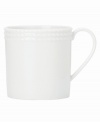 Dine with Wickford dinnerware and tie in timeless sophistication with every meal. This versatile white porcelain mug has a contemporary cylinder shape embossed around the rim with a twisting rope design.